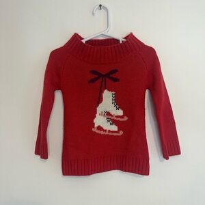 Pink Sweater with Ice Skate Design